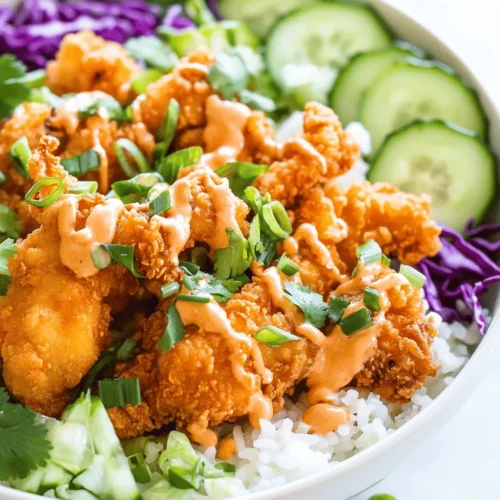 One of the most captivating aspects of Bang Bang Chicken Bowls is their complex flavor profile. The dish expertly balances spicy, sweet, and savory notes that create a delightful explosion of taste in every bite. The crispy chicken, paired with the crunchy freshness of vegetables and the richness of the sauce, results in a harmonious blend that keeps you coming back for more.